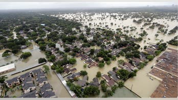 Harvey breaks rain record in Texas as rescues surge