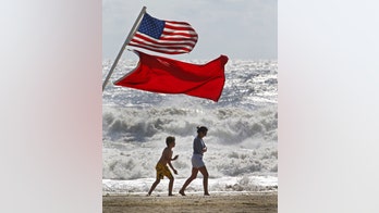 Cruise ship sails through rough waters of Hermine