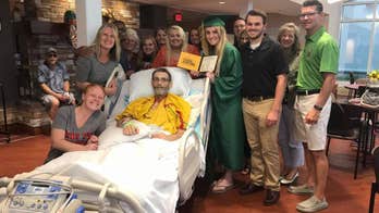 Daughter surprises hospitalized dad with bedside graduation ceremony