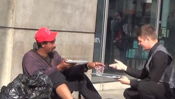 Man dresses as waiter and serves homeless people restaurant-style meals