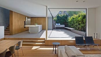 Offset an open floor plan with a 'broken-plan'