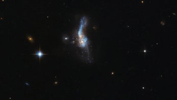 Galaxies collide in stunning picture