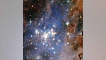 Hubble showcases star cluster that dazzles like diamonds