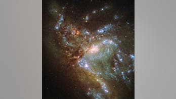 Stunning Hubble image shows two galaxies merging