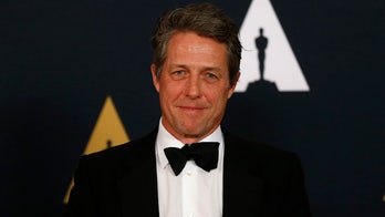 Hugh Grant says he was 'a nasty 50-year-old' before he had kids