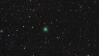 Incredible Hulk? Nah, this glowing, green light in the night sky is a comet