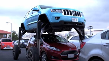 Verizon Hum Rider rises above traffic