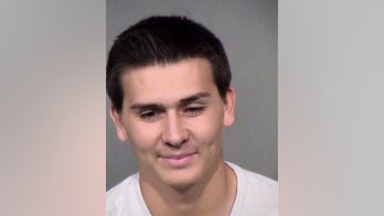 High school senior charged with exposing himself in yearbook photo says he was dared