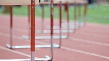 Runner with autism breaks barriers — and hurdles them