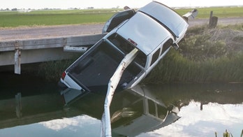 Stolen pickup found impaled on guard rail