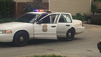 Two Indianapolis police officers shot following car chase, suspect killed