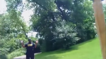Bodycam video shows police searching Iowa defensive end in park