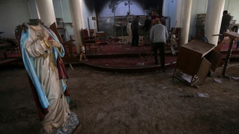 Gasps, tears as Iraqis return to church destroyed by ISIS
