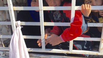 River of tears in northern Iraq as refugees escape the grip of ISIS