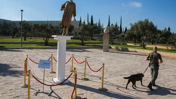 Israeli protesters erect golden statue of High Court chief