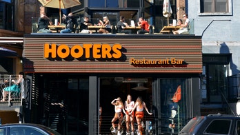 First responder allegedly spit on child, used racial slur at Hooters restaurant