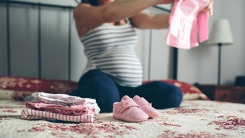 Couple 'lights up sky' for baby gender reveal after losing one of their twins