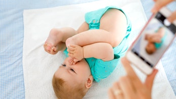 'Glow' in child's picture may be sign of serious eye disease