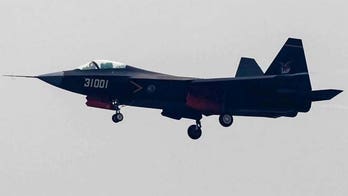 China takes new stealth jet for test flight during Obama visit