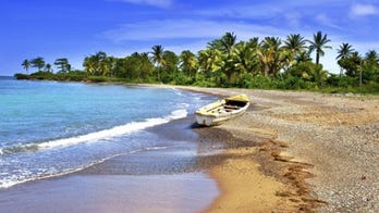 Tourist captures incredible rainbow cloud while on vacation in Jamaica
