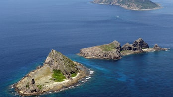 China, Japan island fight reignites with population push