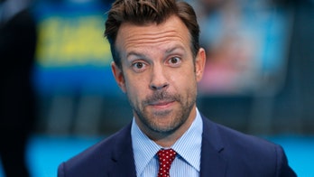Naked women surprise Jason Sudekis on movie set