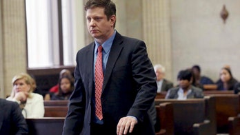 Suspended Chicago officer charged with murder hired as union janitor