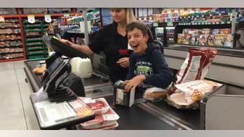 Video of cashier's sweet gesture for special needs boy goes viral