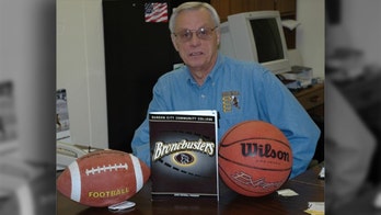 Fan booted from college booster club for defending national anthem