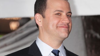 Jimmy Kimmel shares a slice with Gabrielle Giffords and her husband Mark Kelly