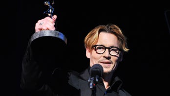 Depp receives award from make-up and hair stylists guild