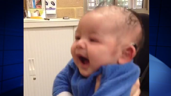 Video captures moment 3-month-old baby hears mother's voice for first time