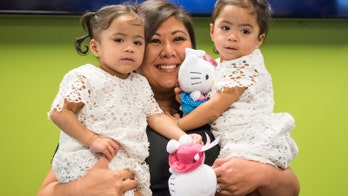 Twins born with deadly disorder meet woman who gave them life-saving bone marrow transplant