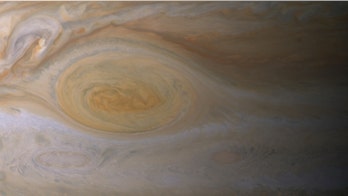 Color of Jupiter's great red spot comes from epic sunburn