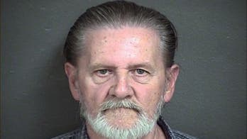Kansas man who robbed bank to escape wife gets home-confinement sentence