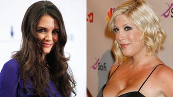 Tori Spelling slams Katie Holmes in memoir, says she can't sing, calls her 'plastic'