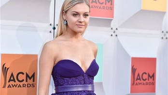 Country star Kelsea Ballerini surprises blind boy battling cancer with special gift