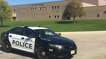 Wisconsin teen stabbed at high school has died; suspect in court