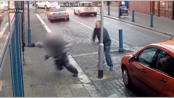 Surveillance footage shows man attacking traffic cop for ticketing him