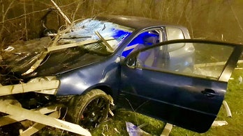 Car impaled by wood planks in shocking crash, but passengers survive