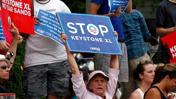 Canadian PM offers Obama possible climate action to secure Keystone deal