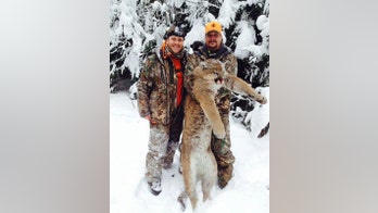 Kid Rock under fire for posing with dead cougar