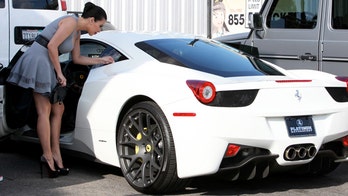 Kim Kardashian Trades SUV for $300G Ferrari