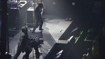 Metal band loses Chicago gig over 'excessive use of guns and violent imagery'