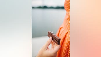 Man slammed by internet for eating Kit Kat 'wrong' proposes to girlfriend with Kit Kat-shaped box