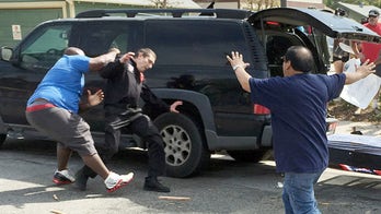 Jewish activist protects KKK members from angry mob at hate protest