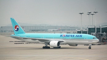 Korean Air passenger dragged off flight while shouting, resisting several police officers