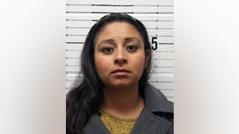 Illegal immigrant ex-school secretary who made bomb threat indicted on gun charges