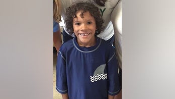 Relatives seek answers after 7-year-old Boston summer camper found dead
