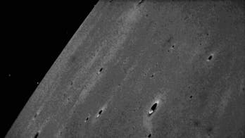 NASA probe beams Its 1st lunar photos to Earth
